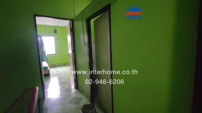 Green bedroom with tiled floor
