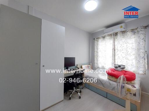 Bedroom with modern furniture and natural light