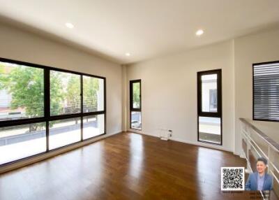 Bright and spacious living room with large windows