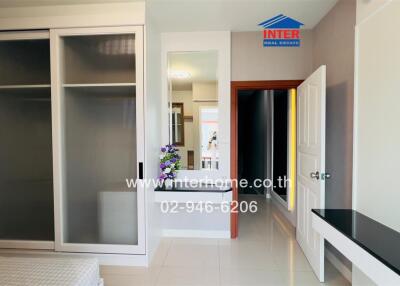Modern bedroom with wardrobe and vanity