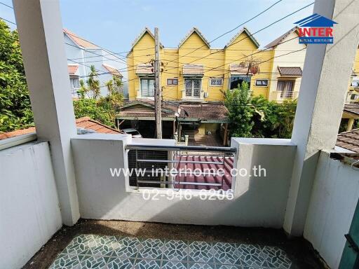 Balcony with a view of neighboring houses