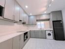 Modern kitchen with built-in appliances and ample storage