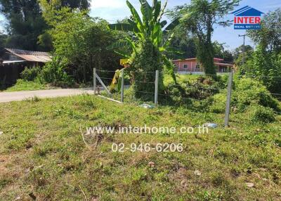 Exterior land plot with greenery and fencing