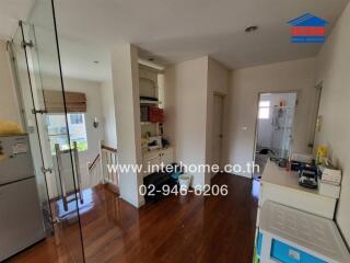 Open living area with wooden flooring