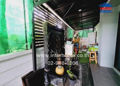 Outdoor Area with Garden Decor and Storage
