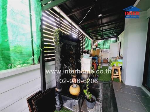 Outdoor Area with Garden Decor and Storage