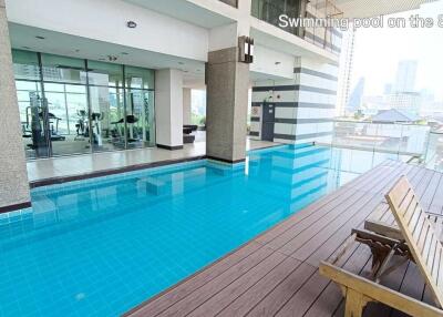Swimming pool on the 8th floor with adjacent gym