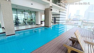 Swimming pool on the 8th floor with adjacent gym