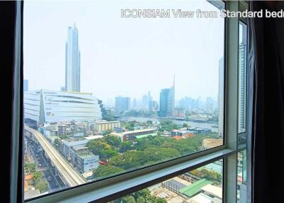 Bedroom with a view of ICONSIAM and cityscape