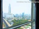 Bedroom with a view of ICONSIAM and cityscape