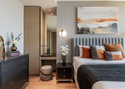 Modern bedroom with artwork and bedside tables