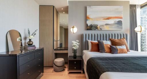 Modern bedroom with artwork and bedside tables