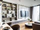 Modern living room with built-in shelves, a large TV, floor-to-ceiling windows, and contemporary furniture