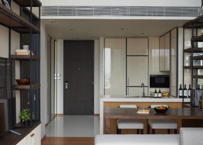 Modern kitchen and dining area with shelves and decor