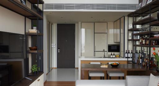 Modern kitchen and dining area with shelves and decor
