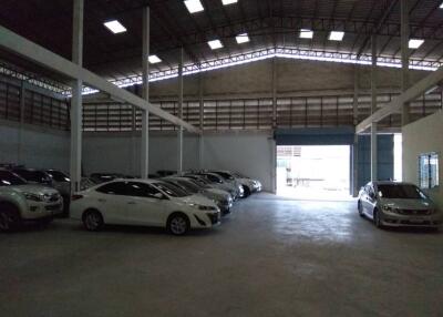 Spacious garage with multiple parked cars