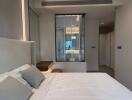 Modern bedroom with bed and upholstered headboard