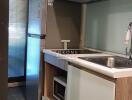 Compact modern kitchen with appliances