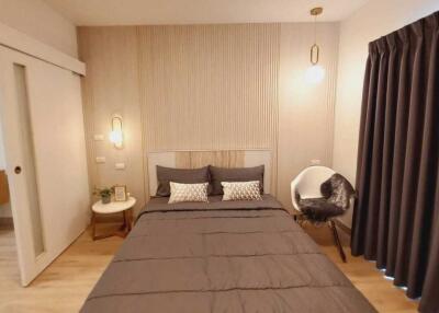 Modern bedroom with double bed and tasteful decor
