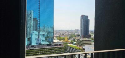 View from the balcony overlooking skyscrapers and cityscape