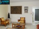 Living room with wooden furniture and decorative items