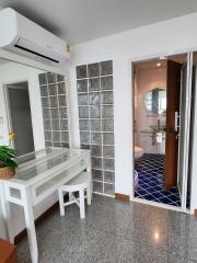 Bedroom with dressing table and bathroom