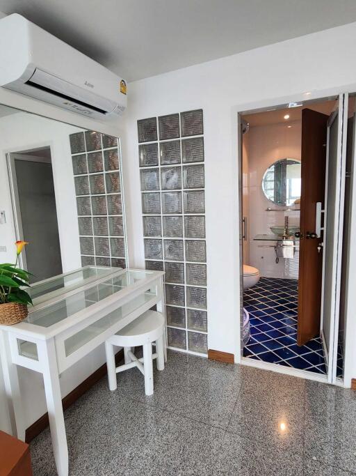 Bedroom with dressing table and bathroom