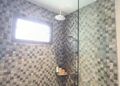 Modern bathroom with tiled shower