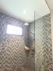 Modern bathroom with tiled shower