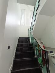 Modern staircase with glass railing