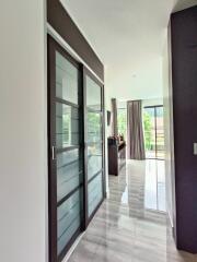 Modern hallway with sliding glass doors