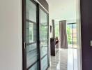 Modern hallway with sliding glass doors