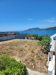 Scenic view of a coastal hillside with ocean