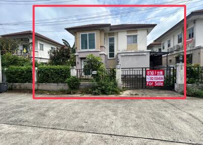 Exterior view of a two-story house for sale