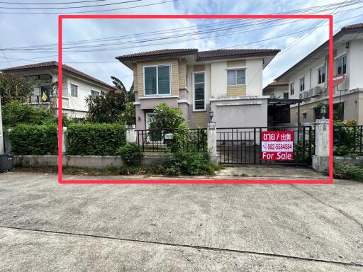 Exterior view of a two-story house for sale