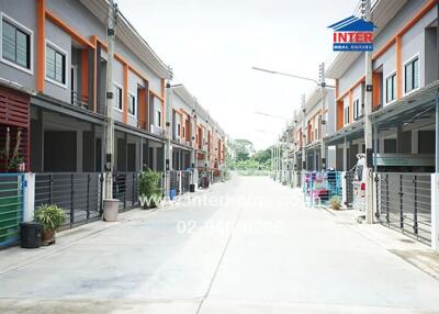 Street view of a modern townhouse complex