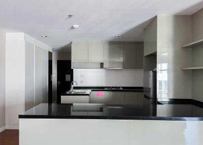 Modern kitchen with sleek appliances and countertops