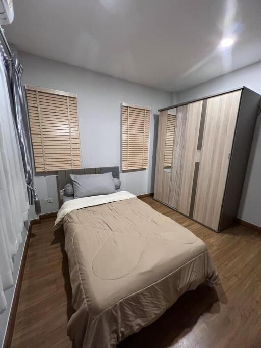 cozy bedroom with wooden accents