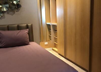 Bedroom with built-in wardrobe and modern decor