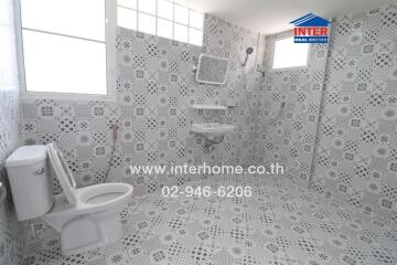 Modern bathroom with patterned tile design