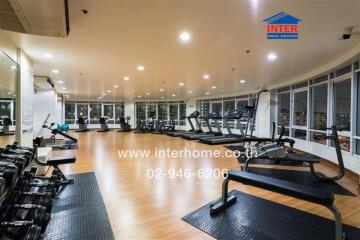 spacious fitness room with modern equipment