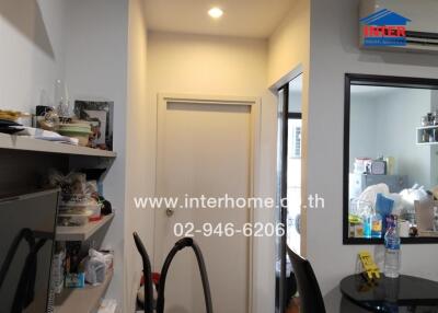 Kitchen with shelves and dining table