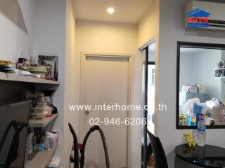 Kitchen with shelves and dining table