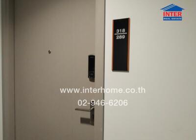 Entrance door with room number and access control system