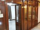 Living room with built-in wooden cabinets