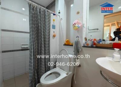 Bathroom with modern amenities and shower