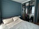 Master bedroom with bed and wardrobe