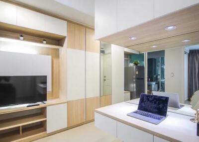 Modern bedroom with built-in storage and workspace