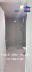 Modern bathroom with glass shower enclosure