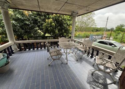Outdoor balcony with seating area
